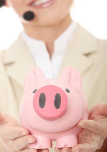 female-call-center-agent-holding-pink-piggy-bank