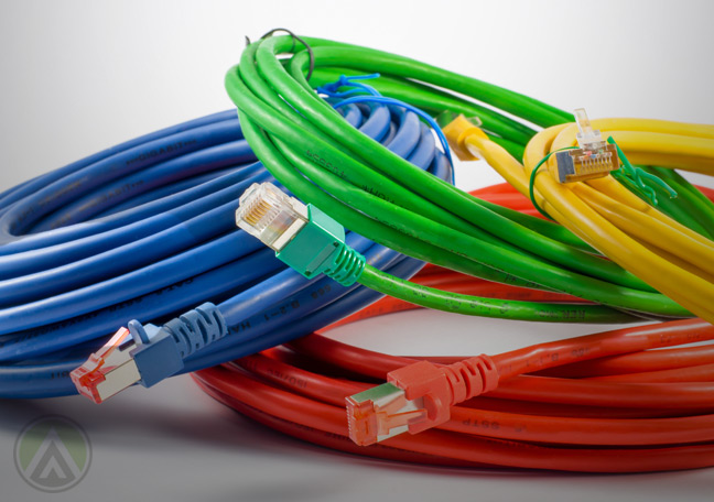 colored-computer-cables-with-white-background