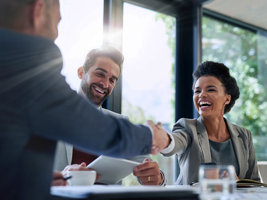 Philippine call center disaster recovery discussion outsourcing partners shaking hands