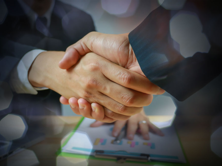 call center in the Philippines sales team shaking hands with client