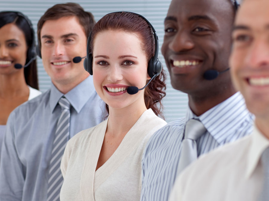 technical support gamification diverse customer experience cx agents team smiling in call center office