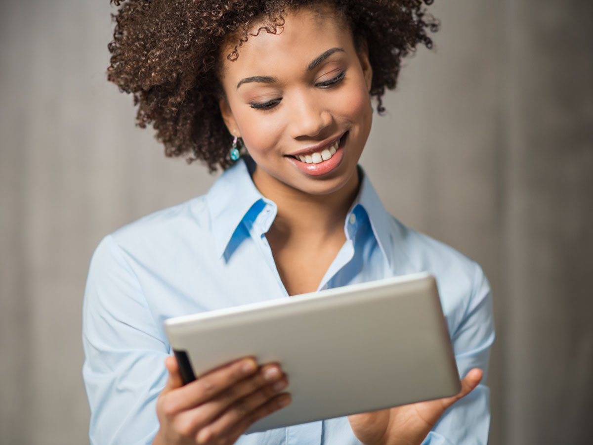 woman using tablet to access customer service