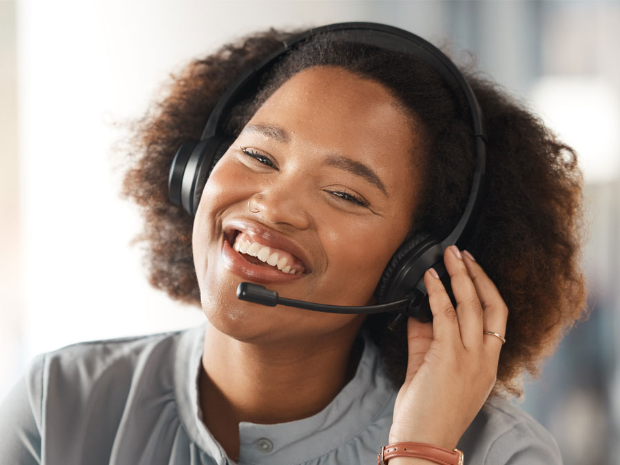 happy customer service call center agent ensuring customer rapport loyalty