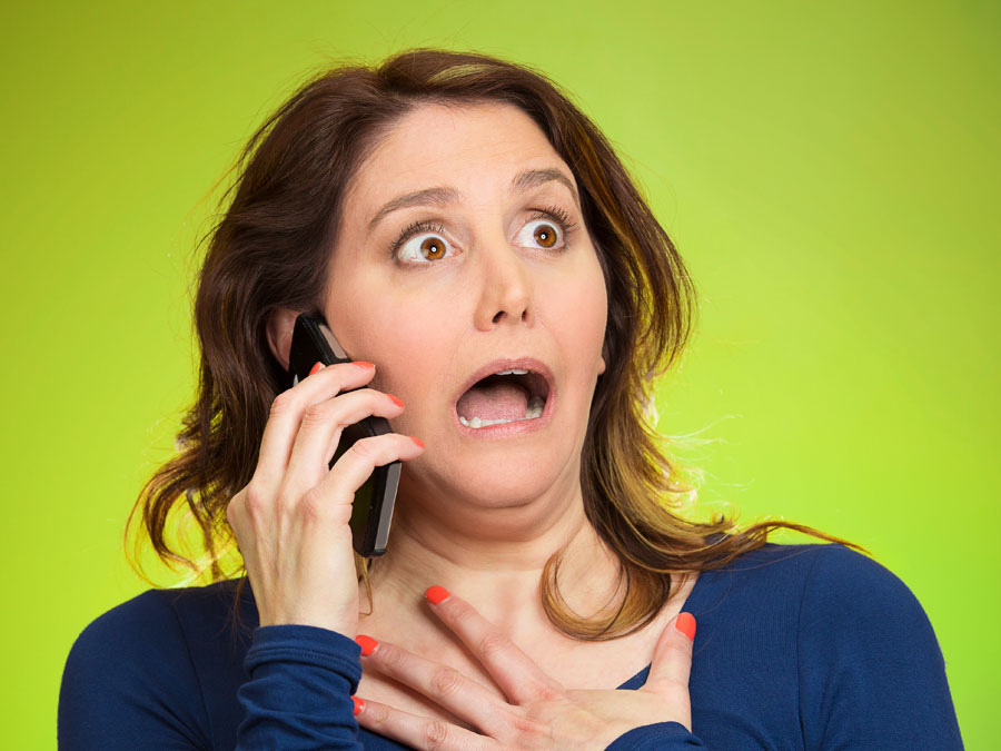 surprised customer talking to call center agent on the phone