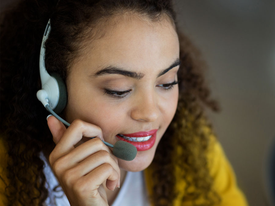 close up customer support representative working in call center