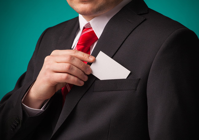 businessman-pulling-business-card