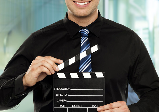 businessman-with-video-cinema-clapper