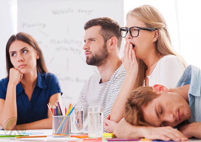 Colleagues-looking-bored-and-sleepy-during-a-meeting