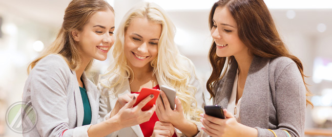 Female-shopper-looking-at-their-smartphones