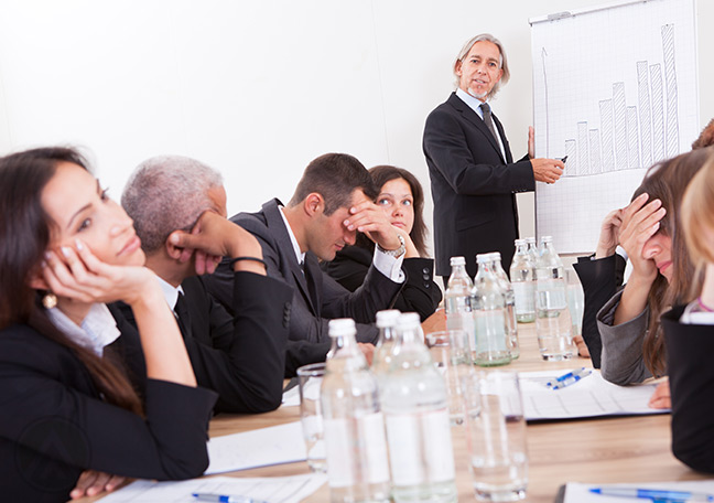 Meeting-attendees-not-paying-attention-to-presenter