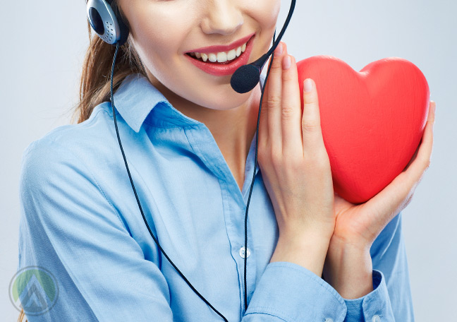 female-call-center-agent-holding-red-heart