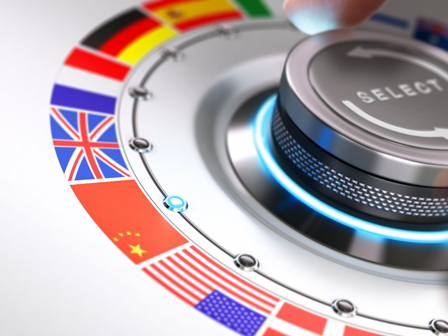 multilingual call center hand turning dial with international flags
