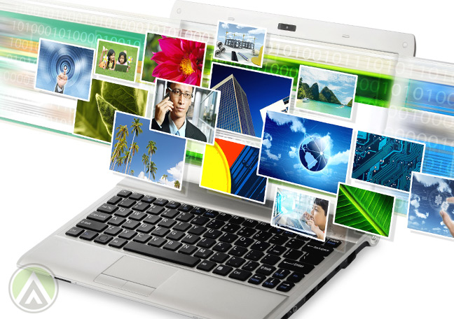 laptop-showing-mul;different-colorful-photos