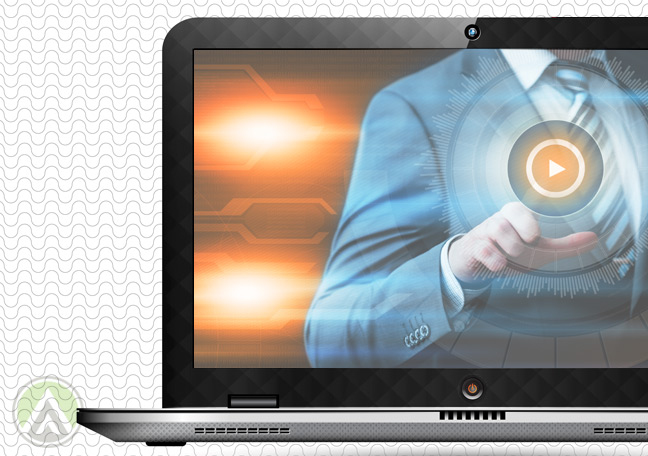 laptop-with-screen-showing-businessman-pushing-play-button-on-video