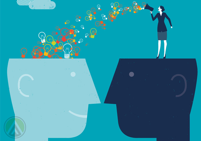 two-heads-facing-each-other-with-female-executive-with-megaphone-blowing-ideas-into-one-head