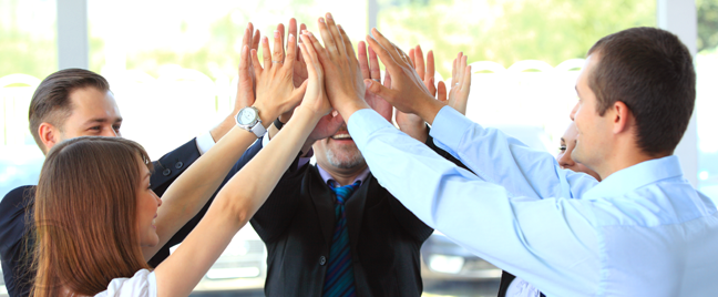 diverse-business-team-high-fiving