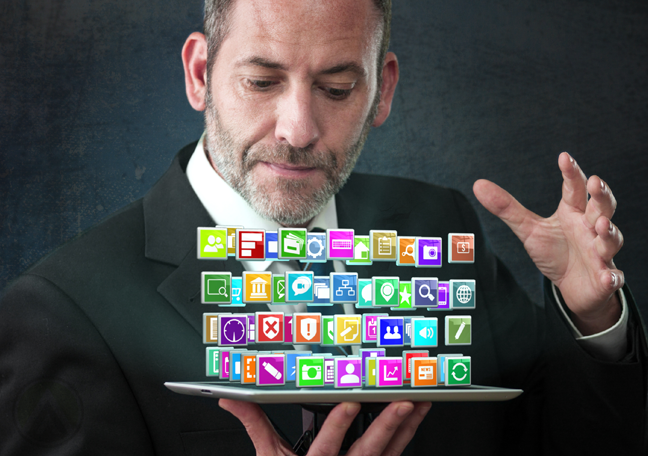 businessman listening with social media icons around him