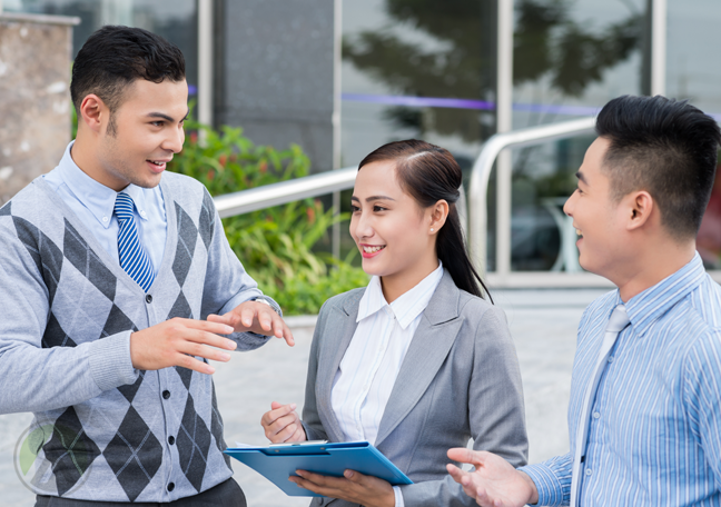 millennial-coworkers-chatting-outside-the-office