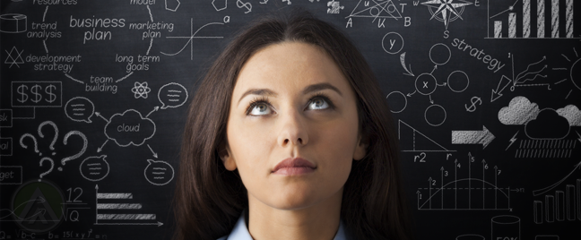 female-business-executive-looking-up-surrounded-by-chalkboard-with-flowchart-graphs-charts