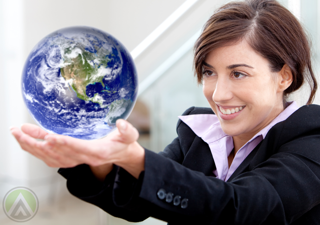 smiling-business-woman-holding-up-globe
