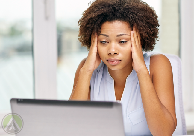 female-business-employee-disappointed-at-laptop