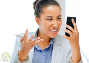 female-employee-confused-frustrated-over-smartphone