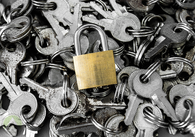 padlock-surrounded-bu-old-keys