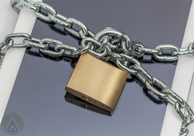 tablet-computer-wrapped-in-chains-and-locked-with-padlock