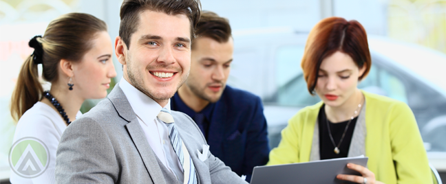 smiling-millennial-with-young-business-team-in-meeting