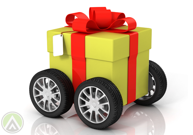 yellow-gift-with-red-ribbons-on-wheels
