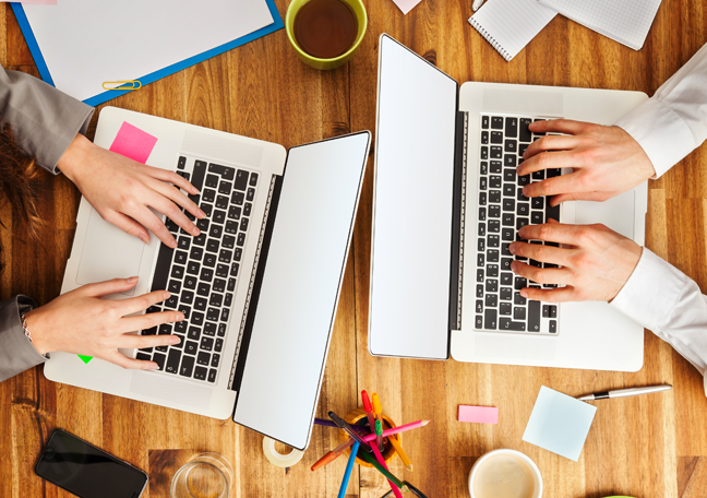 business-employees-working-on-laptop-on-table