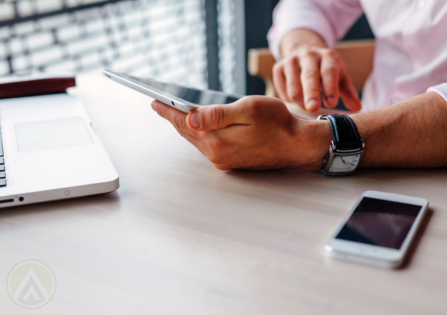 businessman-hands-using-tablet-smartphone