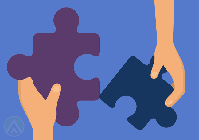 hands-holding-puzzle-pieces-together