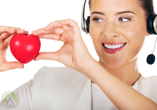 smiling-female-call-center-agent-holding-heart