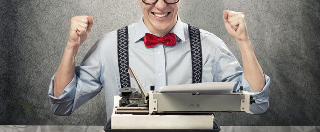 excited-writer-in-bowtie-suspenders-in-front-of-typewriter