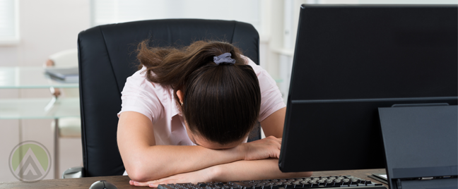 frustrated-female-employee-face-down-on-keyboard