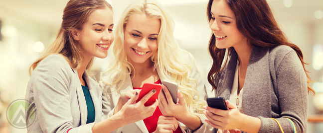 women-shopping-looking-at-smartphones