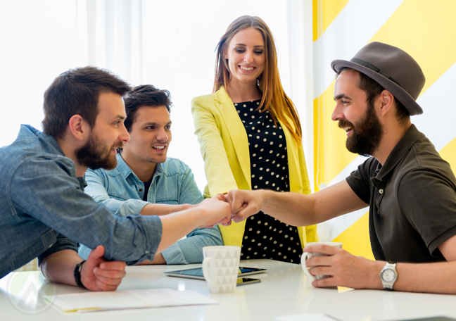 young-business-team-casual-meeting-fistbump