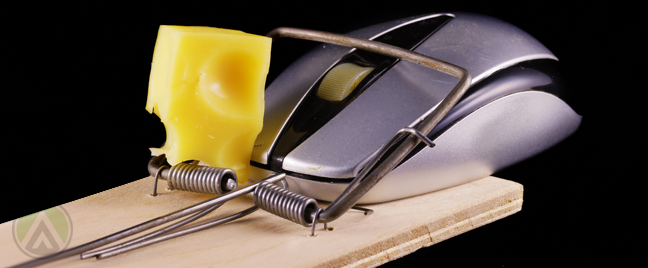 computer-mouse-on-moust-trap-with-cheese
