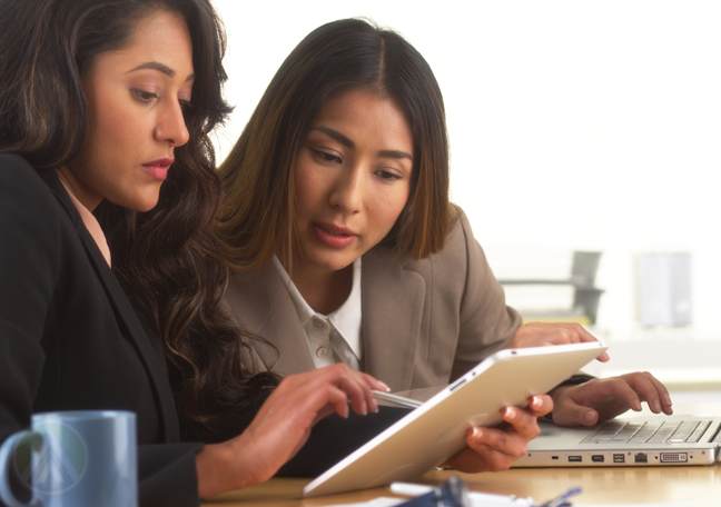 two-female-employees-on-business-discussion