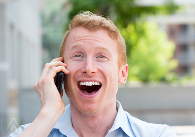 delighted-man-on-phone-call