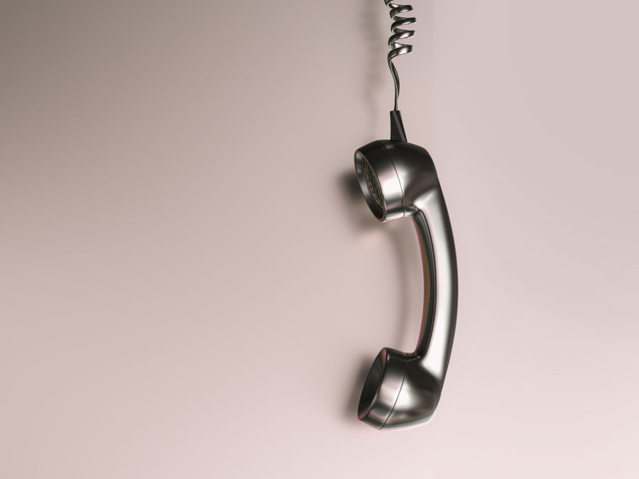 landline phone hanging by cord