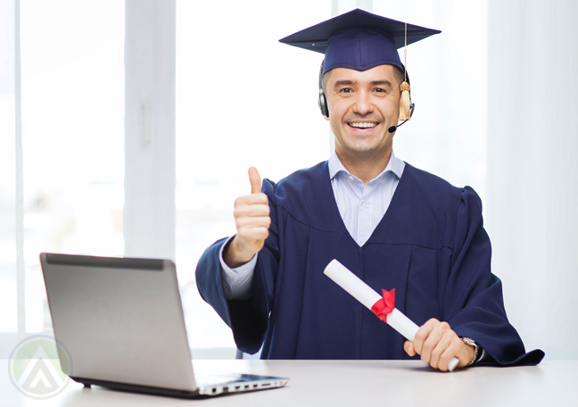 matured-male-college-graduate-at-office-with-laptops