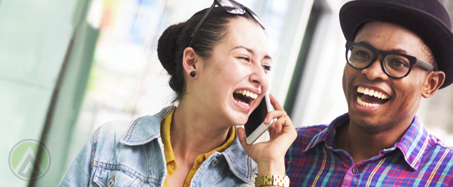 mixed-race-couple-laughing-shopping