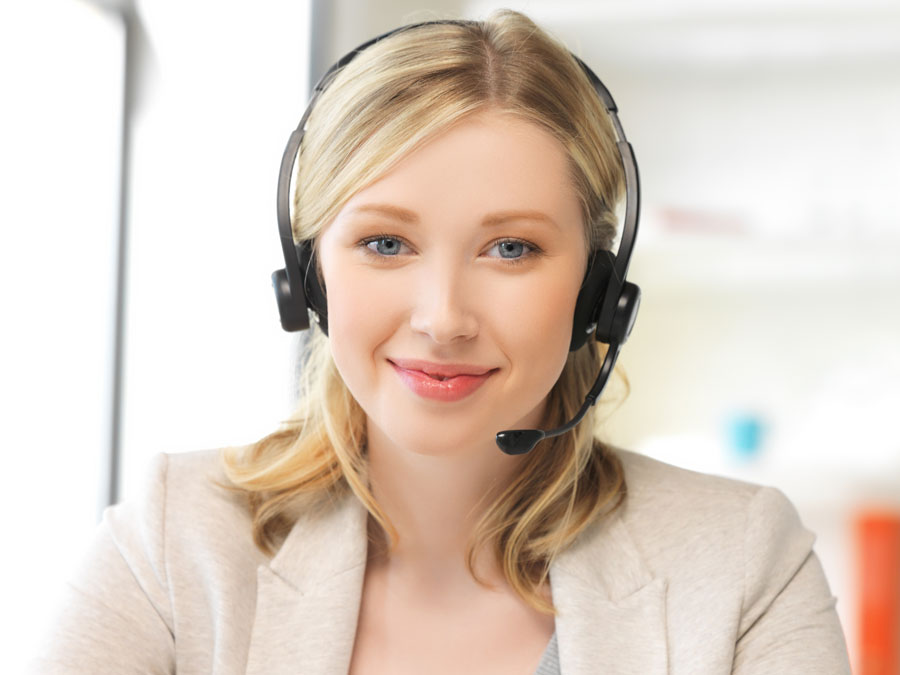 smiling young woman working in a call center