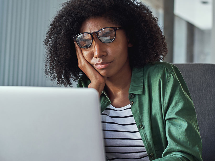 stressed out online shopper using laptop