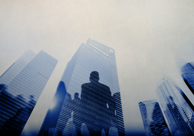 tall-buildings-with-businessmen-sillhouettes