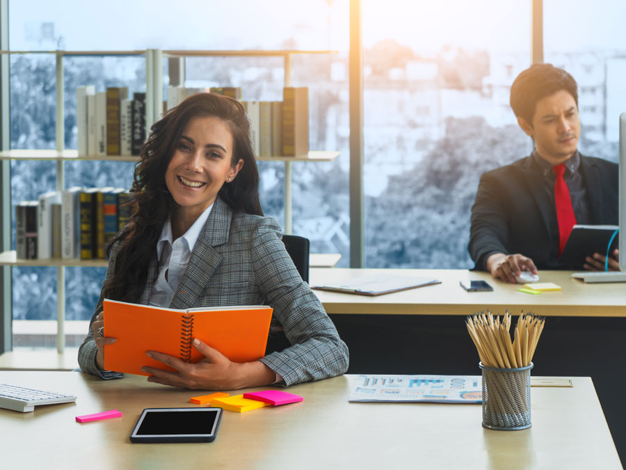 two separate coworkers busy