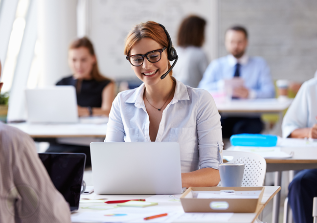 busy-female-call-center-agent-smiling