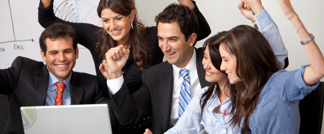 happy-business-team-celebrating-by-laptop